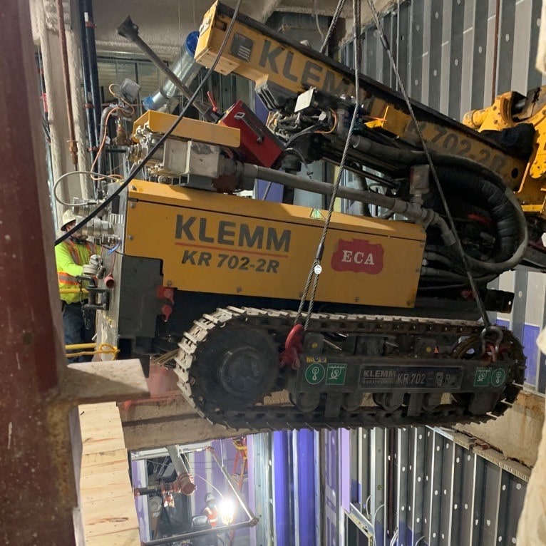 Lowering Drill Rig Into Basement
